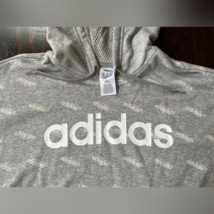Women’s tunic length Adidas hoodie.